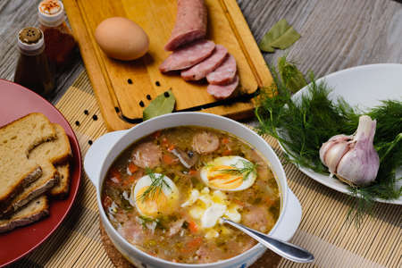 traditional Polish soup zhurek on a wooden backgroundの写真素材