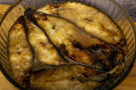 Halibut steaks baked in a glass dish. In soy sauce with honey.の写真素材