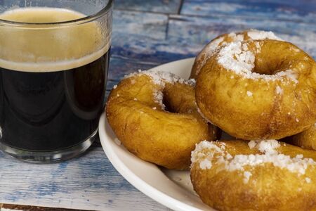 Fresh donuts with powdered sugar.の写真素材