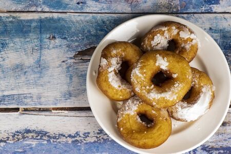 Fresh donuts with powdered sugar.の写真素材