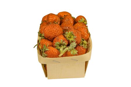 Delicious ripe strawberry in wooden basket isolated on white backgroundの写真素材