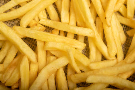 French fries scattered surface texture. Close upの写真素材