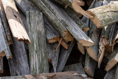 A pile of old boards suitable for the furnace, close-up, selective focus