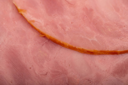 A close-up view of the sliced ham from above
