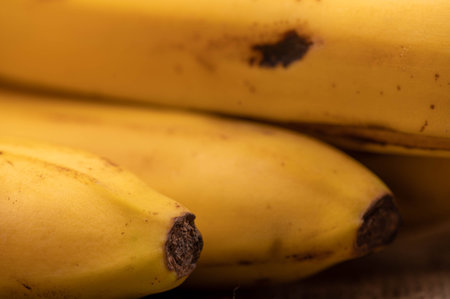 Ripe yellow bananas close-up. Selective focus. Autumn harvestの写真素材