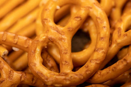 Crispy bread straws with salt, close-up, selective focus, top viewの写真素材