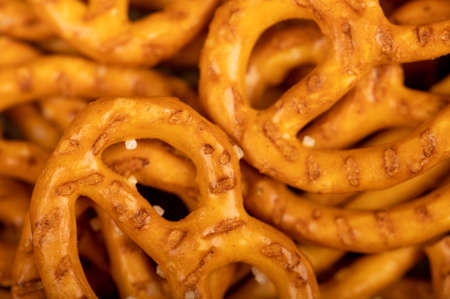 Crispy bread straws with salt, close-up, selective focus, top viewの写真素材