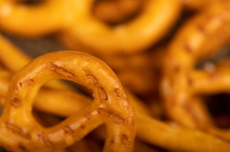 Crispy bread straws with salt, close-up, selective focus, top viewの写真素材