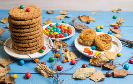 Delicious sweets on the fallen leaves.の写真素材