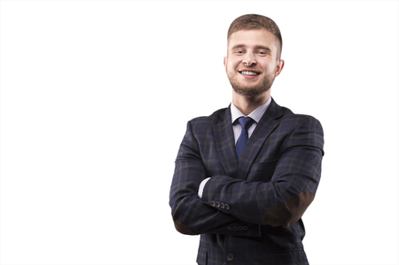 Man stands with his arms crossed and smilingの写真素材