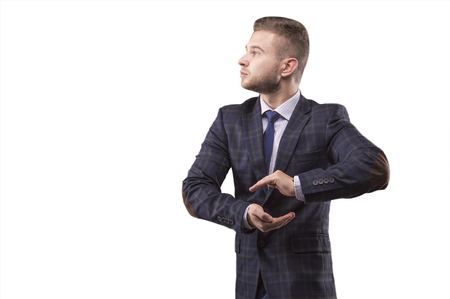 Man in a suit made a shape of a ball from his hands の写真素材