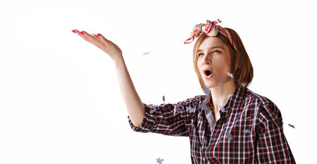 Cute girl sprinkles around puzzles. The concept of preschool and home schooling. Funny board games....