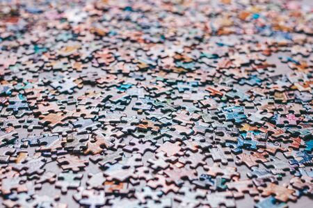 Pieces of puzzles. Home board games. The concept of relaxation and development. Mixed mediaの写真素材