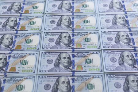 Hundred dollar bills. American dollars in cash. Cash one hundred dollar bills, high resolution dollar background image. Mixed mediaの写真素材