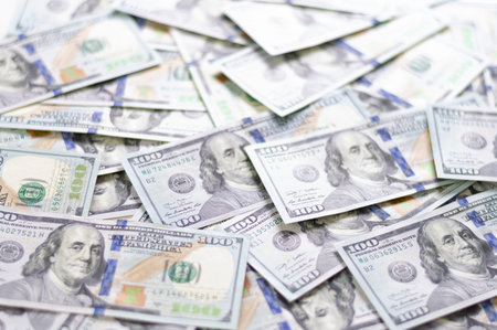 Hundred dollar bills. American dollars in cash. Cash one hundred dollar bills, high resolution dollar background image. Mixed mediaの写真素材
