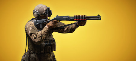 American soldier with a shotgun on an orange background. The concept of military special operations....