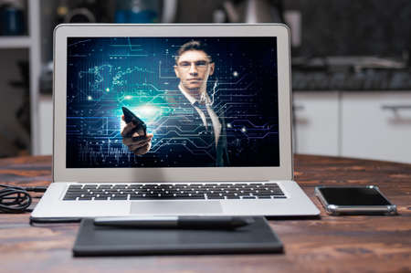 Man in a suit on a digital background holds out the phone. Stock market concept. Double exposure. Mixed mediaの写真素材