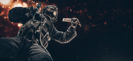Man in military uniform hangs from a rope and swings a special device to break windows. Video games concept. Cybersport. Shooter. Mixed mediaの写真素材