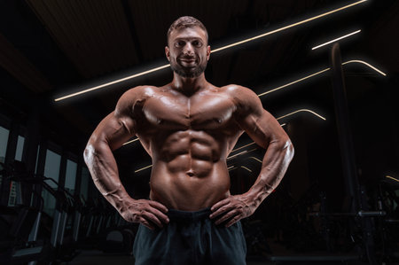 Portrait of an athletic muscular man. Fitness concept. Mixed media