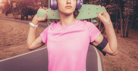 No name portrait of a girl with a skateboard. Sports lifestyle concept. Mixed mediaの写真素材