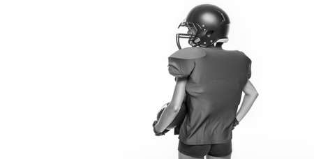 Black and white images of a sports girl in the uniform of an American football team player. Sports concept. White background. Mixed mediaの写真素材