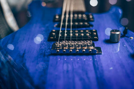 Close-up image of a blue electric guitar. Mixed mediaの写真素材
