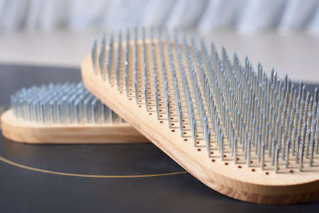 Image of a Sadhu board on a black mat in a bright studio. yoga concept. spiritual practices. Nailing. mixed mediaの写真素材