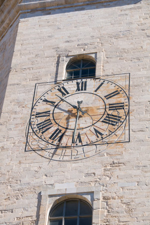 Old  clock on a wall in Girona s cathedral, Catalonia 