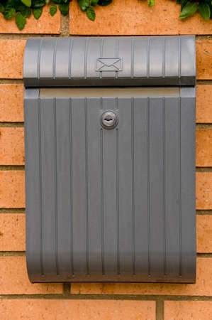 postbox on brick wallの写真素材