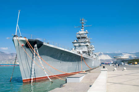 NOVOROSSIYSK, RUSSIA - SEPTEMBER 17, 2015: The cruiser "Mikhail Kutuzov" at the dock in Novorossiysk. Novorossiysk is a city on the coast Tsemess Bay of Black sea. An important transportation center.のeditorial素材