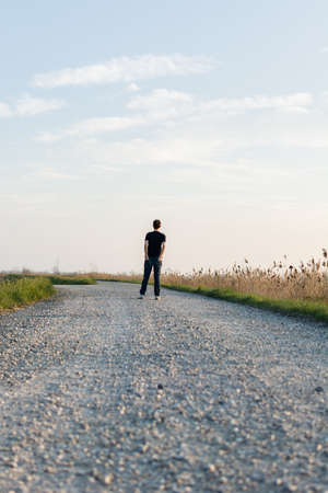 Man alone on the roadの写真素材