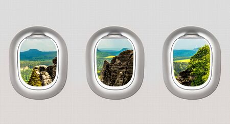 View of Bastei bridge in Saxon Switzerland from airplane windows - flight conceptの写真素材