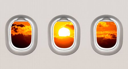 View of sunset from airplane windows - flight conceptの写真素材
