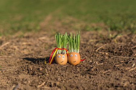 Happy egg family on the soil, Easter