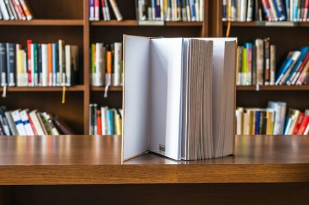 Standing book on the table in libraryの写真素材