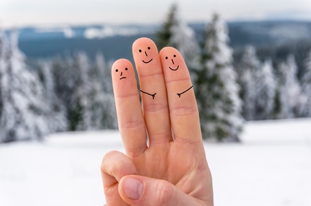 Happy three fingers in winterの写真素材