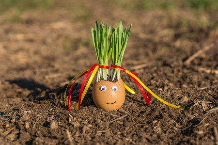 Happy egg family on the soil, Easter