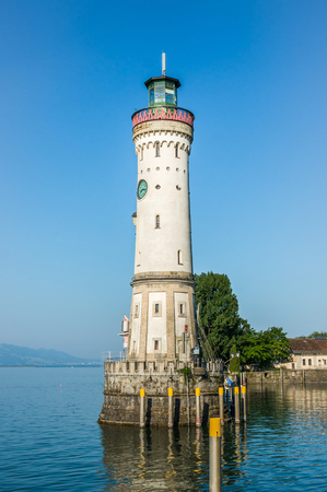 Lighthouse at morning in harbor of Lindau in lake Constance, Germanyの写真素材