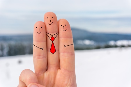 Happy three fingers in winterの写真素材