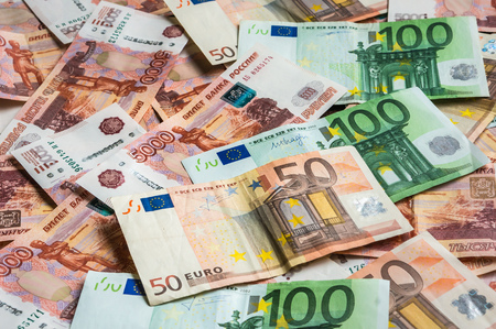 Russian 5 thousand and Euro 50 and 100 money banknotes backgroundの写真素材