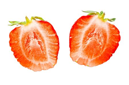 Two half of fresh strawberry isolated on a white backgroundの写真素材