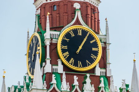 Spasskaya tower and large clock of Kremlin on Red Square in Moscow, Russia