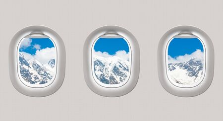 Looking out the windows of a plane to the mountains in Georgia (Svaneti)の写真素材