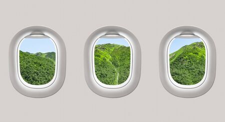 Looking out the windows of a plane to the mountains in Georgia (Svaneti)の写真素材
