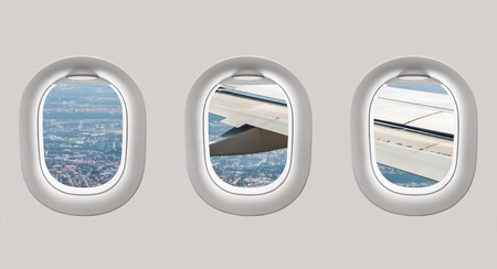 Looking out the windows of a plane to the city of Prague, Czech Republicの写真素材