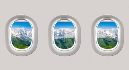 Looking out the windows of a plane to the mountains in Georgia (Svaneti)の写真素材