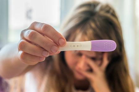 Woman shocked at positive pregnancy test result