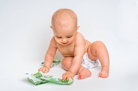 Cute baby with euro bills moneyの写真素材