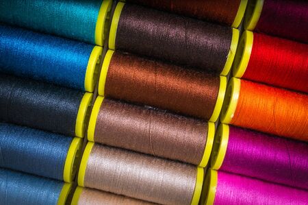 Multicolor sewing threads background - concept of sewingの写真素材