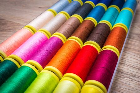 Multicolor sewing threads background - concept of sewingの写真素材